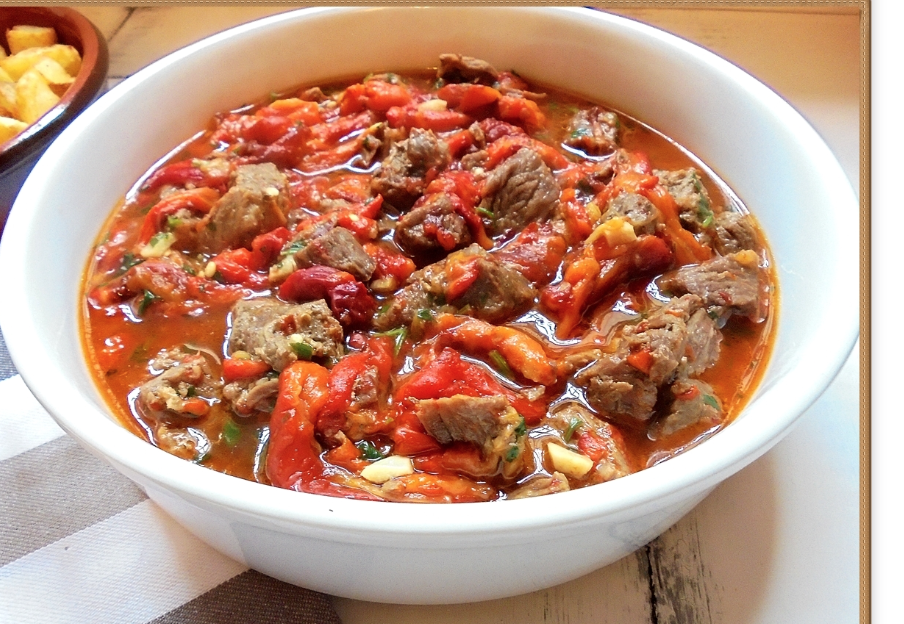 Ternera con pimientos asados.